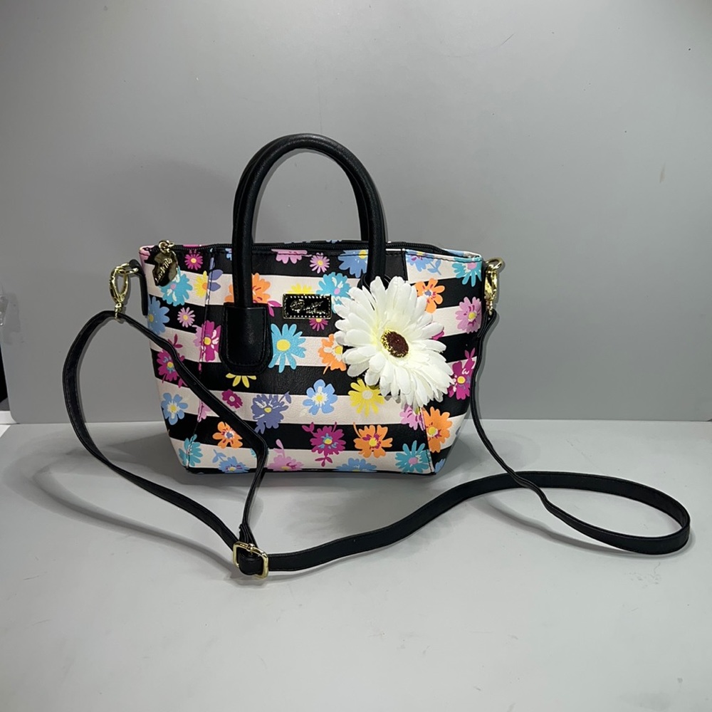 Betsey Johnson striped daisy print vinyl crossbody/satchel bag.